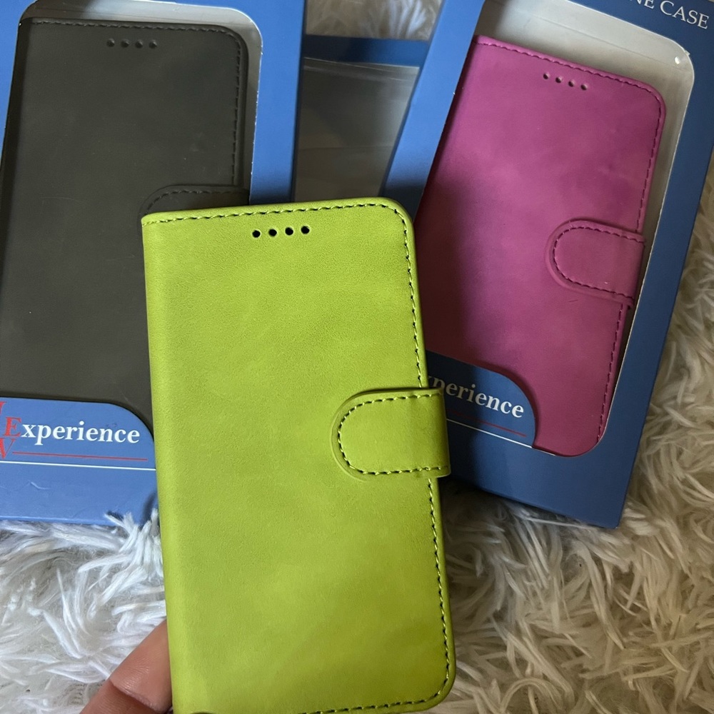 Faux leather IPhone 12 mini case with card holders and magnetic closure.